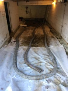 uitbraak garagevloer plaatsen drainage heraanleg vloer in gepolierd beton