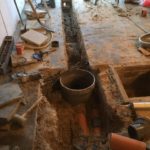 Sint-Pieters-Leeuw openbreken garagevloer en klinkerpad herstellen aanleg RWA buizen toezichtputje gescheiden riolering 2 - Massaert bvba